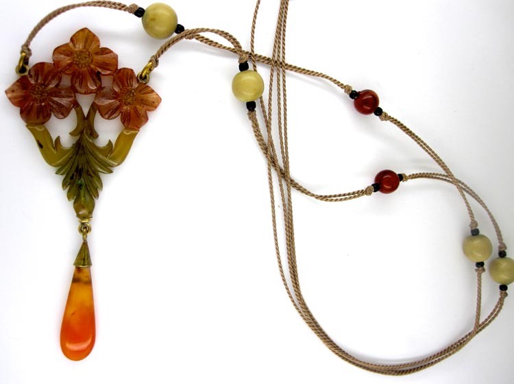Art Nouveau Carved Horn Pendant