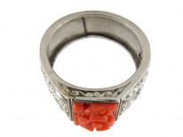 Carved Coral Ring with Diamond Sides Set in Platinum