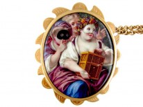 Pair of Enamel & Gold Masked Miniature Brooches