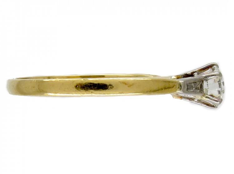 Diamond Solitaire Ring with Diamond Baguette Shoulders