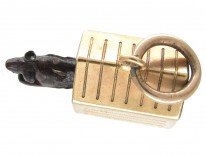 Gold Dog in Kennel Charm