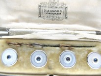 Four 9ct Gold Mother of Pearl & Sapphire Buttons