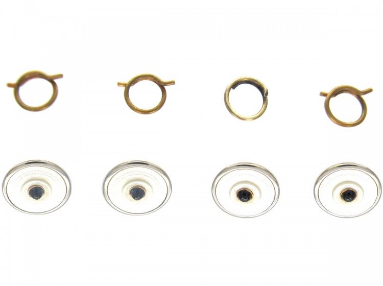 Four 9ct Gold Mother of Pearl & Sapphire Buttons