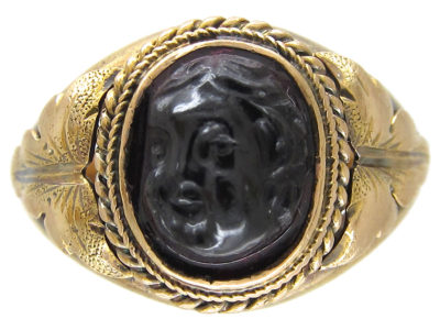 Victorian Gold Ring with a Carved Garnet of a Cherub’s Head