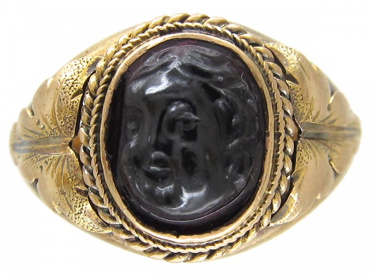 Victorian Gold Ring with a Carved Garnet of a Cherub's Head