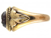 Victorian Gold Ring with a Carved Garnet of a Cherub's Head