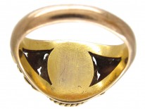 Victorian Gold Ring with a Carved Garnet of a Cherub's Head
