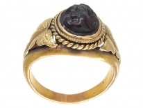 Victorian Gold Ring with a Carved Garnet of a Cherub's Head