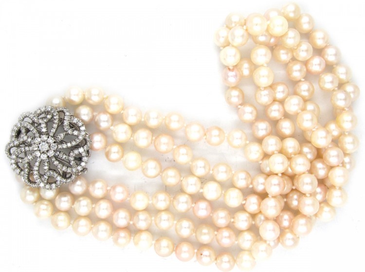Cultured Pearl Three Strand Necklace with Large Diamond Set Flower Clasp