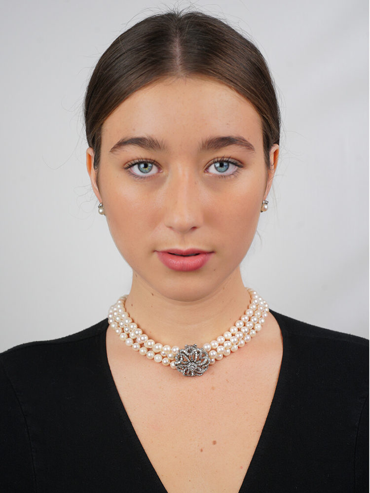 Cultured Pearl Three Strand Necklace with Large Diamond Set Flower Clasp