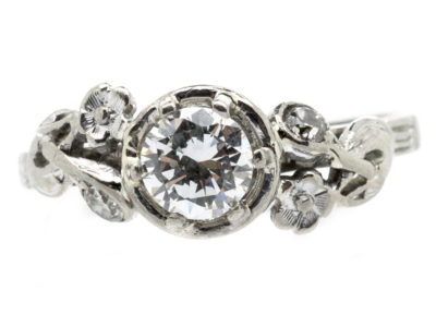 18ct White Gold & Diamond Solitaire Ring with Diamond Flower Shoulders