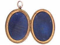 Edwardian Rose Gold Oval Locket With Bow Motif