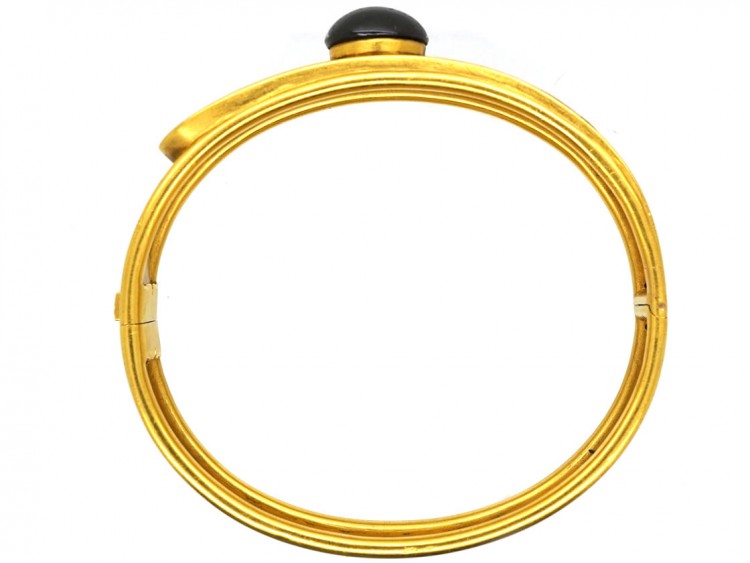 Victorian 18ct Gold Buckle Design Bangle Set With a Cabochon Garnet