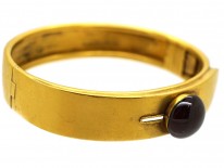 Victorian 18ct Gold Buckle Design Bangle Set With a Cabochon Garnet