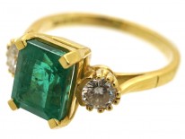 18ct Gold Rectangular Emerald & Diamond Three Stone Ring