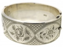Silver Bangle With Engraved Flower Motif