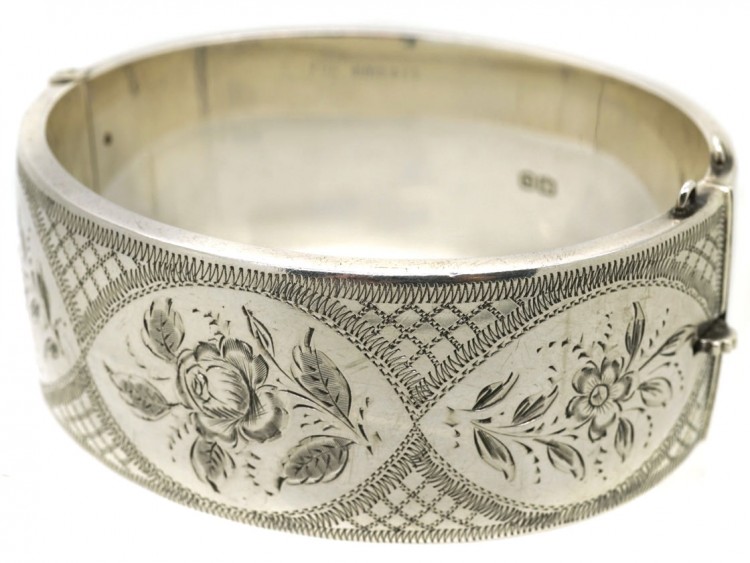 Silver Bangle With Engraved Flower Motif