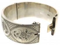 Silver Bangle With Engraved Flower Motif
