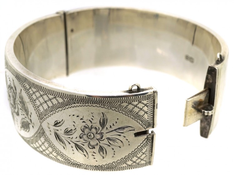 Silver Bangle With Engraved Flower Motif