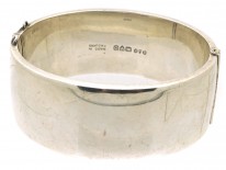 Silver Bangle With Engraved Flower Motif