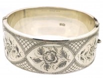 Silver Bangle With Engraved Flower Motif