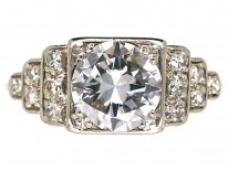 Palladium Single Stone Diamond Ring With Stepped Diamond Shoulders