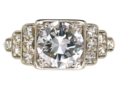 Palladium Single Stone Diamond Ring With Stepped Diamond Shoulders
