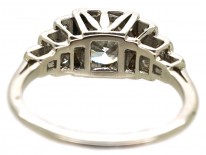 Palladium Single Stone Diamond Ring With Stepped Diamond Shoulders
