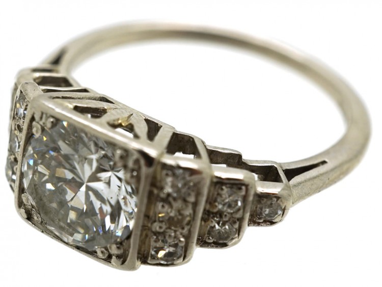 Palladium Single Stone Diamond Ring With Stepped Diamond Shoulders