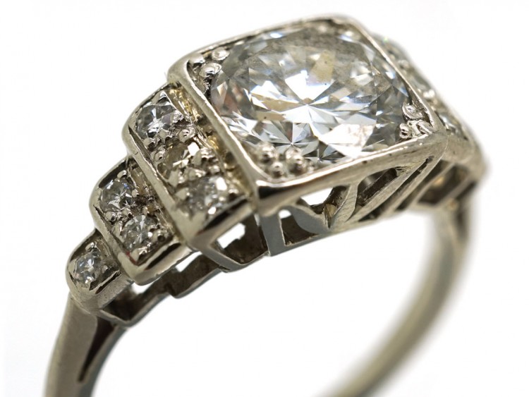 Palladium Single Stone Diamond Ring With Stepped Diamond Shoulders