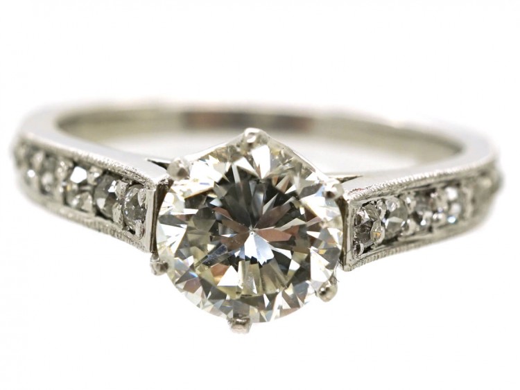 Platinum & Diamond Solitaire Ring With Diamond Set Shoulders