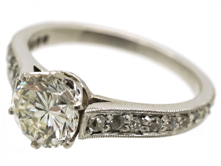 Platinum & Diamond Solitaire Ring With Diamond Set Shoulders