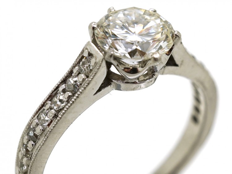Platinum & Diamond Solitaire Ring With Diamond Set Shoulders