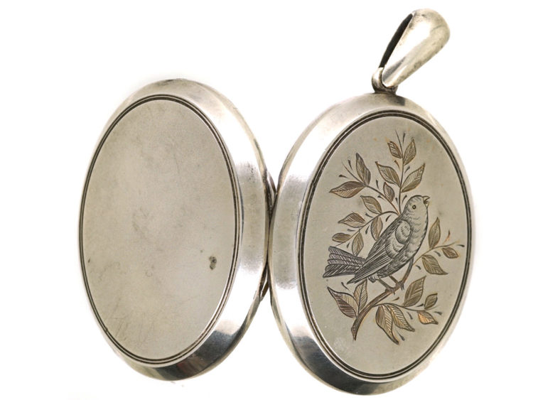Victorian Silver Oval Shaped Locket With Bird in Bough Motif