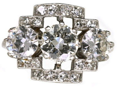 Art Deco Platinum & Three Stone Diamond Ring Within a Geometric Setting Art Deco Platinum & Three Stone Diamond Ring Within a Geometric Setting