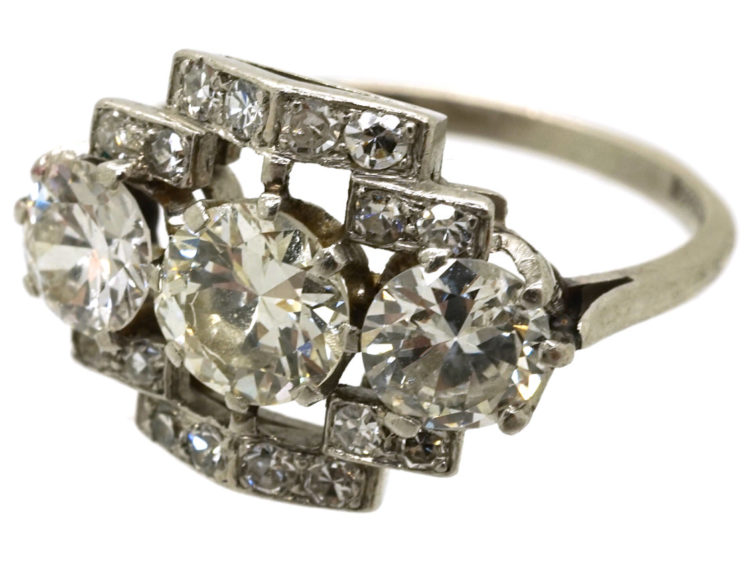 Art Deco Platinum & Three Stone Diamond Ring Within a Geometric Setting