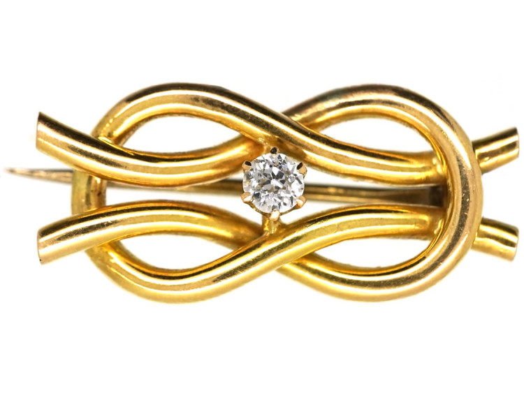 Edwardian 15ct Gold Lover's Knot Brooch Set With a Diamond