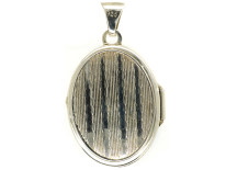 Small Silver Oval Locket With Flower Decoration