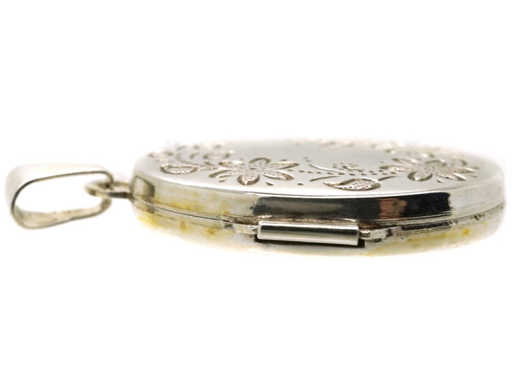 Small Silver Oval Locket With Flower Decoration