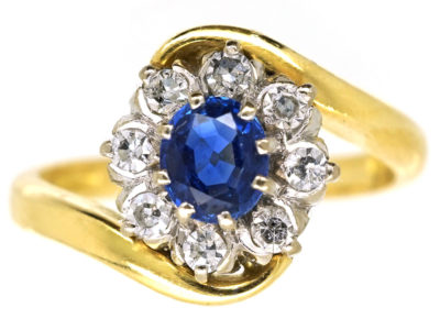 18ct Gold, Sapphire & Diamond Crossover Cluster Ring 18ct Gold, Sapphire & Diamond Crossover Cluster Ring