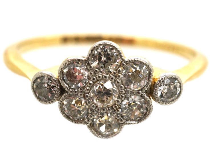 Edwardian Diamond Cluster Ring With a Diamond on Either Side