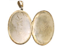 Victorian Oval Silver Locket With Entwined Ribbon Design