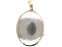 Victorian Oval Silver Locket With Entwined Ribbon Design