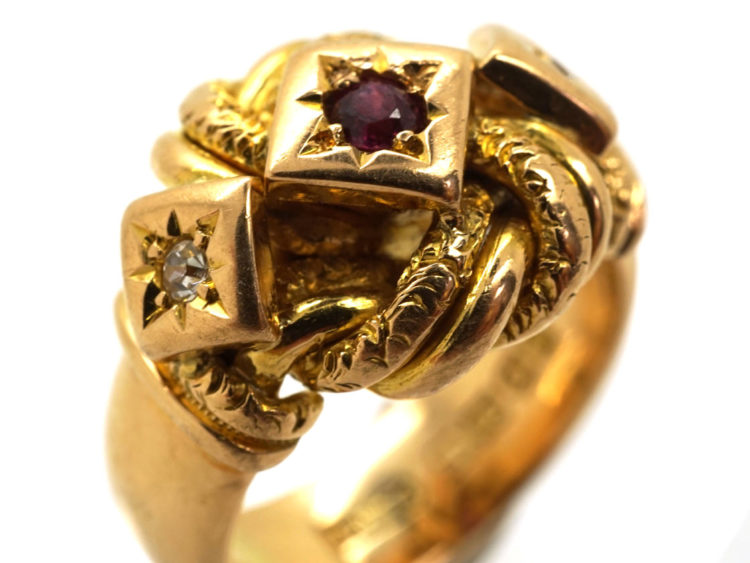 18ct Lover's Knot Ring set with a Ruby & Two Diamonds
