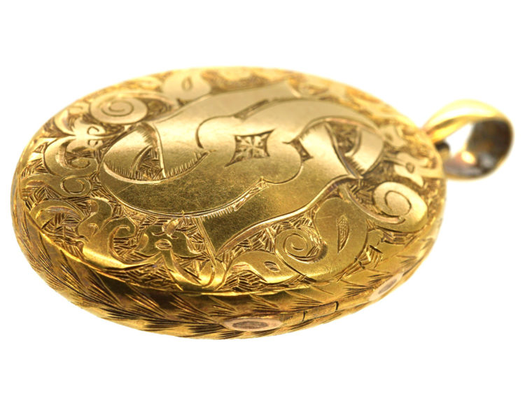 Victorian 18ct Oval Locket with Star & Natural Split Pearl Design