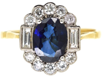 18ct Gold Sapphire & Diamond Oval Cluster Ring with Baguette Diamonds on Either Side 18ct Gold Sapphire & Diamond Oval Cluster Ring with Baguette Diamonds on Either Side