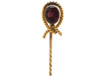 Edwardian 15ct Gold Tie Pin set with a Garnet within a Knot