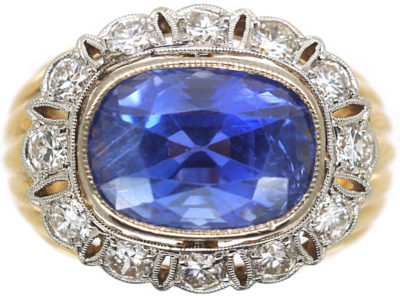 14ct Gold Large Oval Sapphire & Diamond Cluster Ring 14ct Gold Large Oval Sapphire & Diamond Cluster Ring