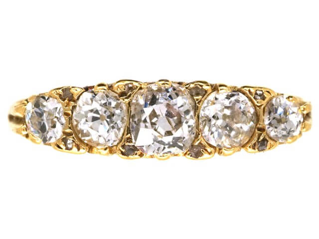 Carved half hoop engagement rings