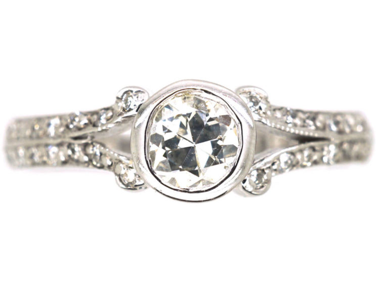 18ct White Gold Solitaire Diamond Ring with Pave Set Diamond Shoulders